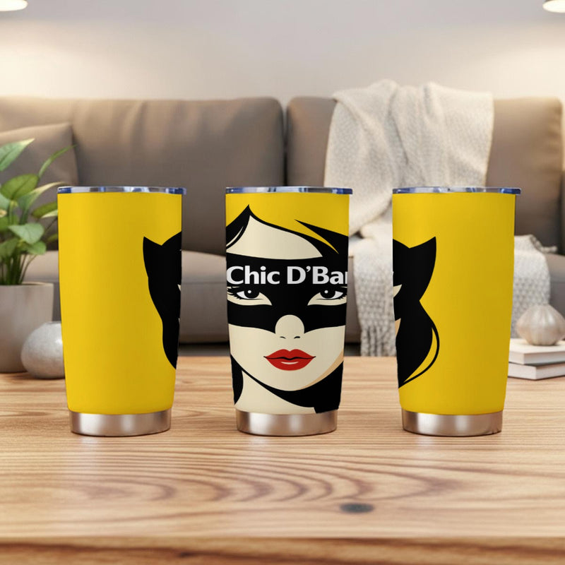 Three yellow tumblers with a face design and 'Chic D'Bar' text on a wooden table.